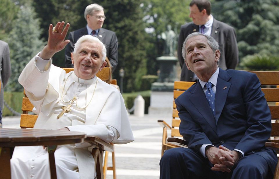 President George W. Bush listens to Pope Benedict XVI during a visit to the Lourdes grotto in the Vatican Gardens June 13, 2008. (CNS/Reuters/Jason Reed)