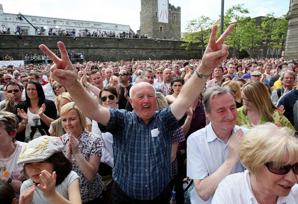 A crowd in Derry, Northern Ireland, celebrates June 15, 2010, after the release of the Saville report on the 1972 Bloody Sunday shootings. (CNS/Reuters)