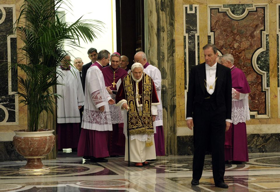 Pope Benedict XVI walks with a cane as he arrives for a meeting of cardinals at which he read his resignation in this Feb. 11, 2013, file photo from the Vatican. There were no media members in attendance. (CNS/L'Osservatore Romano) Pope Benedict XVI walks with a cane as he arrives for a meeting of cardinals at which he read his resignation in this Feb. 11, 2013, file photo from the Vatican. There were no media members in attendance. (CNS/L'Osservatore Romano)