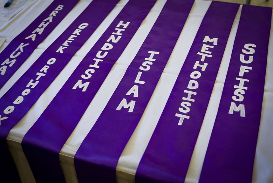 The names of different religions are lined up near a registration table for the annual Unity Walk Sept. 21, 2014, in Washington. (CNS/Tyler Orburn) The names of different religions are lined up near a registration table for the annual Unity Walk Sept. 21, 2014, in Washington. (CNS/Tyler Orburn)