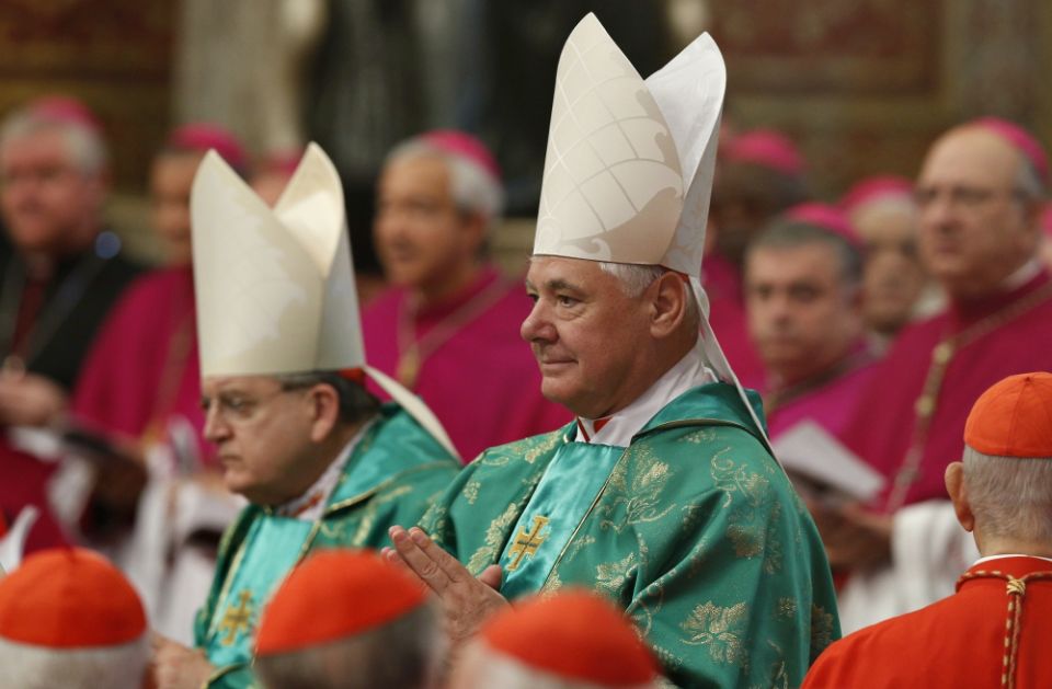 Cardinal Raymond Burke and Cardinal Gerhard Müller arrive in procession for a Mass celebrated by Pope Francis to open the Synod of Bishops on the family in St. Peter's Basilica at the Vatican Oct. 5, 2014. (CNS/Paul Haring) Cardinal Raymond Burke and Cardinal Gerhard Müller arrive in procession for a Mass celebrated by Pope Francis to open the Synod of Bishops on the family in St. Peter's Basilica at the Vatican Oct. 5, 2014. (CNS/Paul Haring)