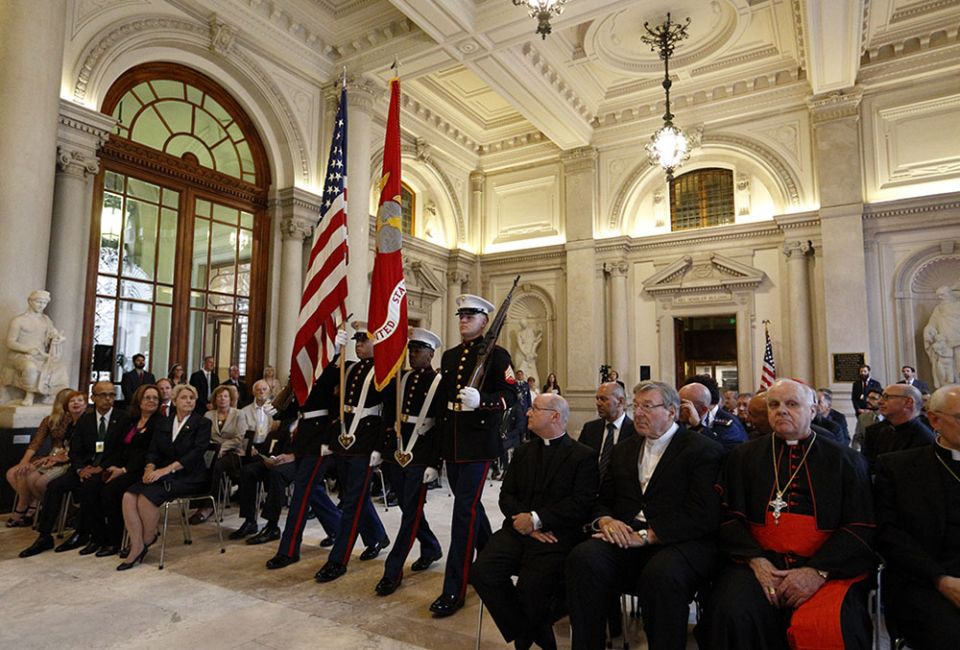 A Marine Corps color guard carries the U.S. and Marine flags during the inauguration of the new headquarters of the U.S. Embassy to the Holy See in Rome Sept. 9, 2015. (CNS/Paul Haring)