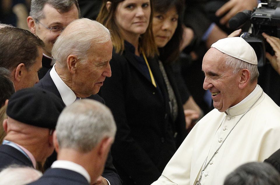 Then-U.S. Vice President Joe Biden meets Pope Francis after both leaders spoke at a conference on adult stem cell research at the Vatican in April 2016. (CNS/Paul Haring)