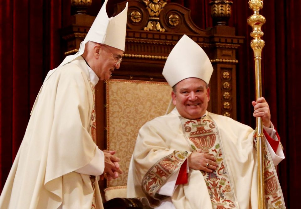 Archbishop Bernard Hebda takes the cathedra during his installation Mass May 13, 2016, at the Cathedral of St. Paul in St. Paul, Minnesota. Archbishop Carlo Maria Viganò, former nuncio to the U.S., is at left. (CNS/The Catholic Spirit/Dave Hrbacek) Archbishop Bernard Hebda takes the cathedra during his installation Mass May 13, 2016, at the Cathedral of St. Paul in St. Paul, Minnesota. Archbishop Carlo Maria Viganò, former nuncio to the U.S., is at left. (CNS/The Catholic Spirit/Dave Hrbacek)