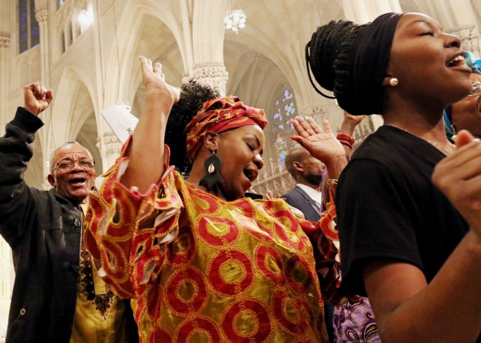 Members of the Mixed African Choir of St. Augustine-Our Lady of Victory Parish in the Bronx, New York, sing during the annual Black History Month Mass at St. Patrick's Cathedral in New York Feb. 5. (CNS/Gregory A. Shemitz) Members of the Mixed African Choir of St. Augustine-Our Lady of Victory Parish in the Bronx, New York, sing during the annual Black History Month Mass at St. Patrick's Cathedral in New York Feb. 5. (CNS/Gregory A. Shemitz)