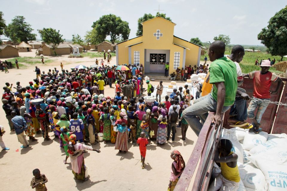 People wait in line for food distribution outside a church April 27, 2017, in Makunzi Wali, Central African Republic. (CNS/Reuters/Baz Ratner)