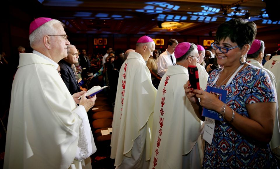 Archbishop Joseph Kurtz of Louisville, Ky., former president of the U.S. Conference of Catholic Bishops, processes with other prelates during a Fortnight for Freedom Mass July 3 in Orlando, Florida.