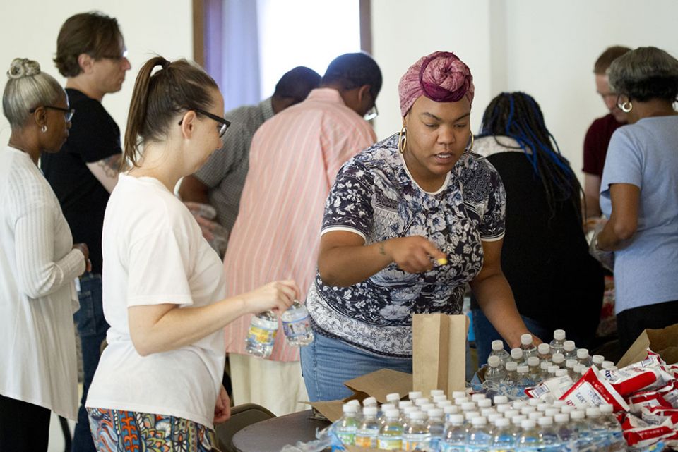 Parishioners at Holy Name of Jesus Church in Washington pack lunches for the poor June 25, 2017. (CNS/Jose Montoya)