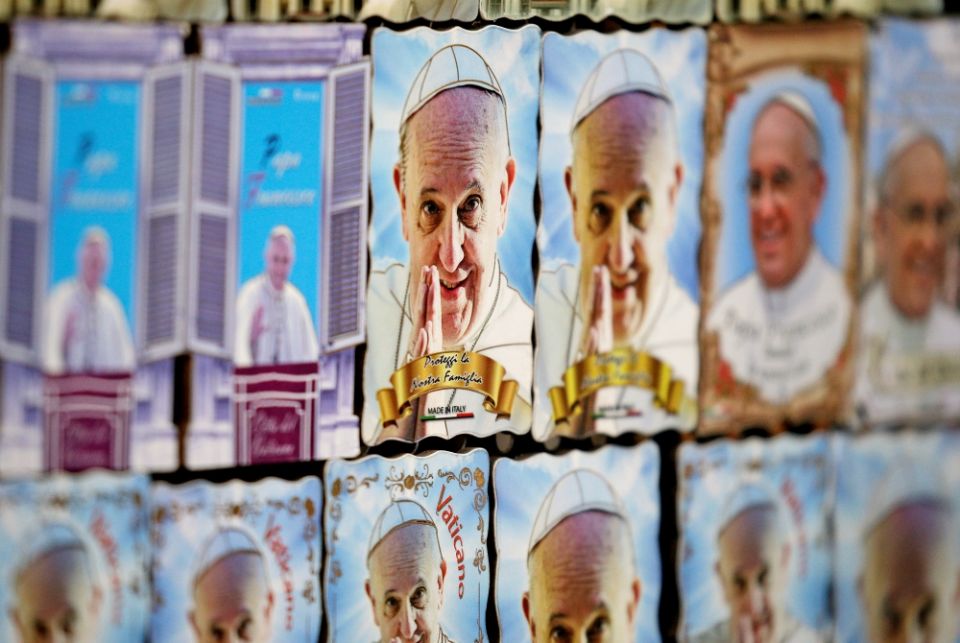 Magnets depicting Pope Francis are seen Aug. 3 at a street vendor's souvenir stand in downtown Rome. (CNS/Reuters/Max Rossi)