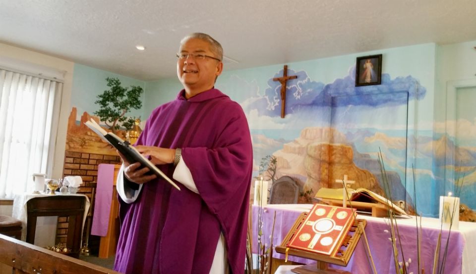 Fr. Rafael Bercasio speaks to tourists gathered for Sunday Mass in late March at El Cristo Rey Chapel in Grand Canyon National Park in Arizona. (CNS/Florida Catholic/Ana Rodriguez-Soto) Fr. Rafael Bercasio speaks to tourists gathered for Sunday Mass in late March at El Cristo Rey Chapel in Grand Canyon National Park in Arizona. (CNS/Florida Catholic/Ana Rodriguez-Soto)
