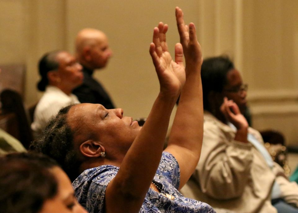 A woman prays during a Mass for solidarity and peace Aug. 24 at St. James Cathedral Basilica in Brooklyn, New York, The liturgy was held in response to the violent and deadly white supremacist demonstrations in Charlottesville, Virginia. A woman prays during a Mass for solidarity and peace Aug. 24 at St. James Cathedral Basilica in Brooklyn, New York, The liturgy was held in response to the violent and deadly white supremacist demonstrations in Charlottesville, Virginia.
