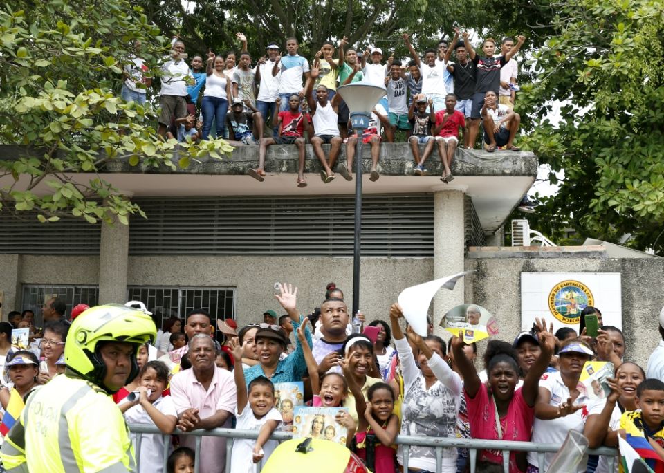 The crowd is seen on the roadway as Pope Francis blesses the cornerstone of Talitha Qum homeless shelter in Cartagena, Colombia, Sept. 10. (CNS/Paul Haring) The crowd is seen on the roadway as Pope Francis blesses the cornerstone of Talitha Qum homeless shelter in Cartagena, Colombia, Sept. 10. (CNS/Paul Haring)
