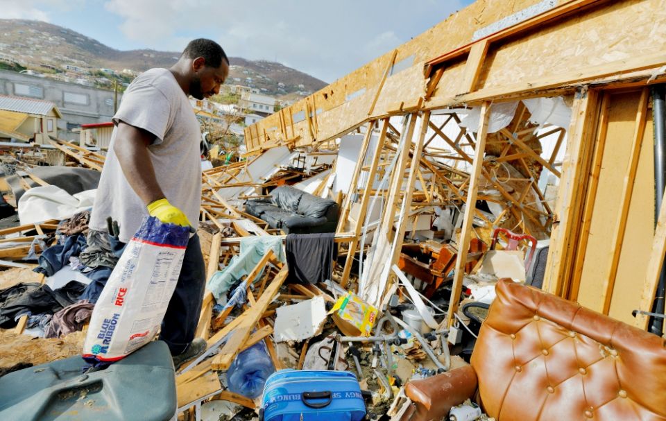 A man looks through the debris of his destroyed home in the aftermath of Hurricane Irma Sept. 17 in St. Thomas in the U.S. Virgin Islands. (CNS/Reuters/Jonathan Drake) A man looks through the debris of his destroyed home in the aftermath of Hurricane Irma Sept. 17 in St. Thomas in the U.S. Virgin Islands. (CNS/Reuters/Jonathan Drake)