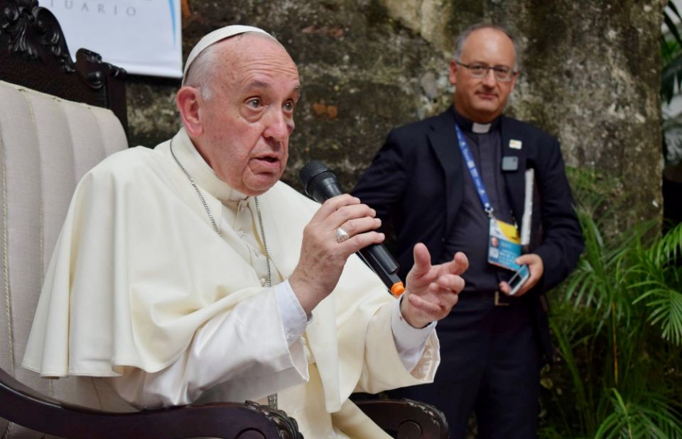 Jesuit Fr. Antonio Spadaro is seen behind Pope Francis during a meeting with Jesuits and laypeople associated with Jesuit institutions in Cartagena, Colombia, Sept. 10. (CNS/Courtesy of La Civiltà Cattolica) Jesuit Fr. Antonio Spadaro is seen behind Pope Francis during a meeting with Jesuits and laypeople associated with Jesuit institutions in Cartagena, Colombia, Sept. 10. (CNS/Courtesy of La Civiltà Cattolica)