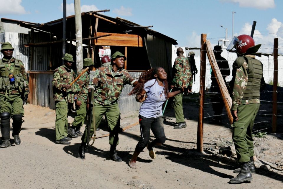 A police officer pushes a supporter of the Kenyan National Super Alliance during clashes Nov. 28, 2017, in Nairobi. (CNS/Reuters/Thomas Mukoya) A police officer pushes a supporter of the Kenyan National Super Alliance during clashes Nov. 28, 2017, in Nairobi. (CNS/Reuters/Thomas Mukoya)