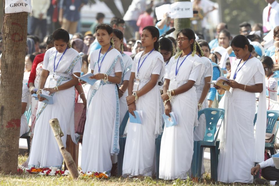 Women attend Pope Francis' celebration of Mass and the ordination of priests in Suhrawardy Udyan park in Dhaka, Bangladesh, Dec. 1, 2017. (CNS/Paul Haring) Women attend Pope Francis' celebration of Mass and the ordination of priests in Suhrawardy Udyan park in Dhaka, Bangladesh, Dec. 1, 2017. (CNS/Paul Haring)