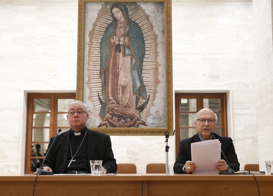 Bishop Juan Ignacio Gonzalez Errazuriz of San Bernardo, Chile, and Auxiliary Bishop Fernando Ramos Perez of Santiago, Chile, attend a press conference in Rome May 18. Bishop Gonzalez said every bishop in Chile offered his resignation to Pope Francis after Bishop Juan Ignacio Gonzalez Errazuriz of San Bernardo, Chile, and Auxiliary Bishop Fernando Ramos Perez of Santiago, Chile, attend a press conference in Rome May 18. Bishop Gonzalez said every bishop in Chile offered his resignation to Pope Francis after