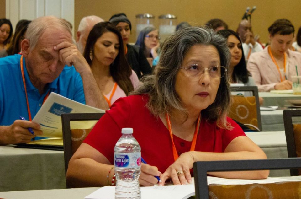 Participants take notes during a May 30 workshop at a meeting convened in Tucson, Arizona, by the Catholic Legal Immigration Network Inc. (CNS/Courtesy of CLINIC)