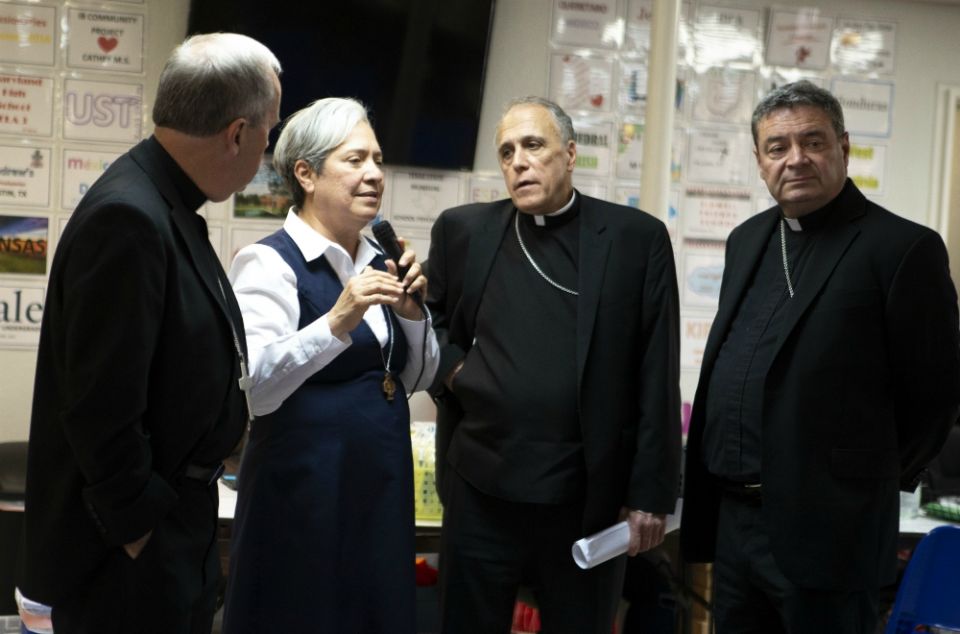 Sr. Norma Pimentel, executive director of Catholic Charities of the Rio Grande Valley in Texas, speaks to an audience July 1 as she shows a delegation of U.S. bishops a respite center for new immigrant arrivals in McAllen, Texas. (CNS/Chaz Muth)