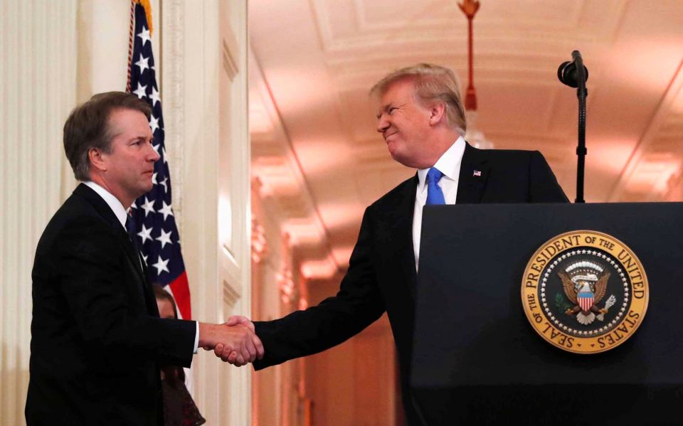 U.S. President Donald Trump introduces his Supreme Court nominee Brett Kavanaugh, a Catholic, July 9 at the White House in Washington. (CNS/Leah Millis, Reuters)