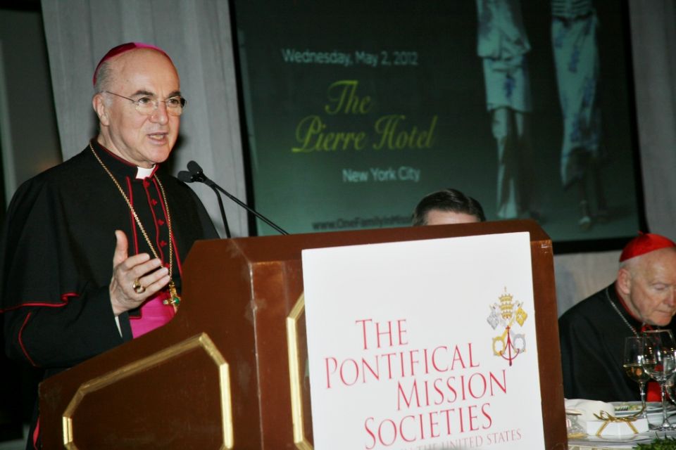 Archbishop Carlo Maria Viganò speaks at a dinner honoring then-Cardinal Theodore McCarrick, at right, in May 2012. (CNS/PMS/Michael Rogel)