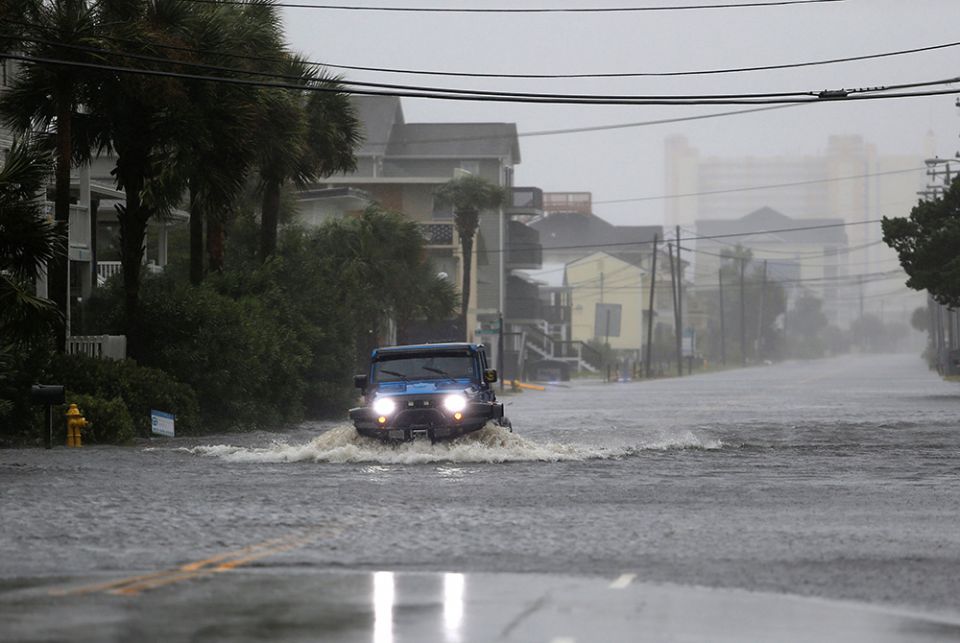 A vehicle navigates a flooded road Sept. 14, 2018, during Hurricane Florence in North Myrtle Beach, South Carolina. The next year, the coastal city of Charleston experienced 89 days of flooding, nearly one every five days. Charleston's previous record, 58 A vehicle navigates a flooded road Sept. 14, 2018, during Hurricane Florence in North Myrtle Beach, South Carolina. The next year, the coastal city of Charleston experienced 89 days of flooding, nearly one every five days. Charleston's previous record, 58