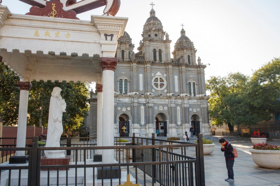 A woman prays Oct. 1 outside St. Joseph Catholic Church in Beijing. (CNS/Isaac Brekken, EPA) A woman prays Oct. 1 outside St. Joseph Catholic Church in Beijing. (CNS/Isaac Brekken, EPA)