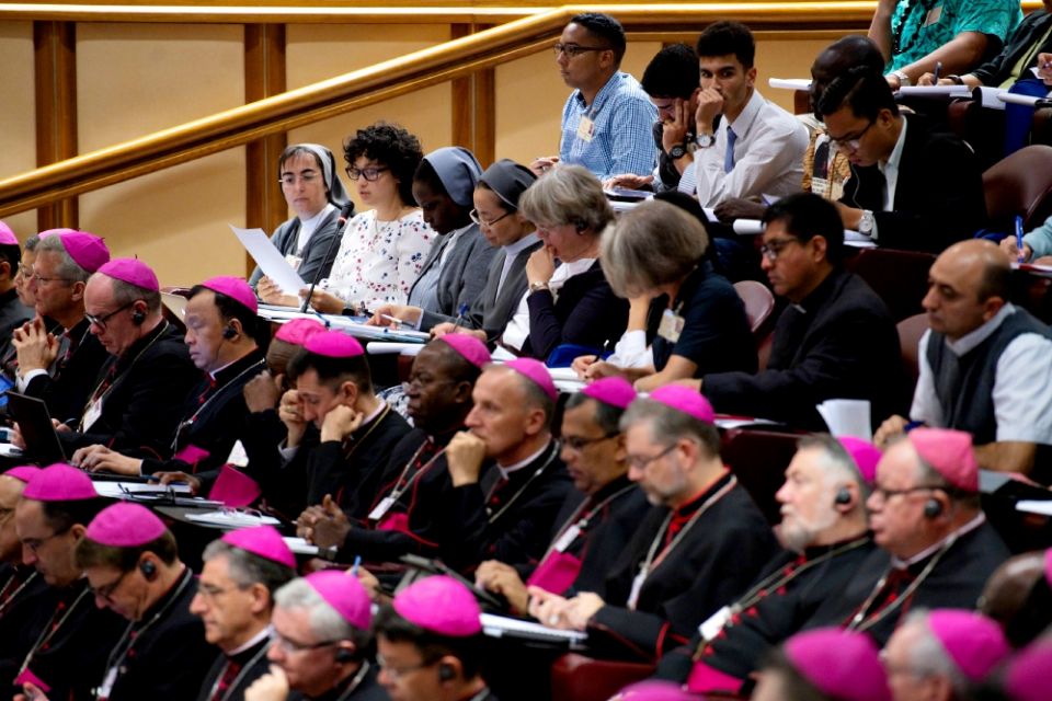 Women religious are seen at a session of the Synod of Bishops on young people, the faith and vocational discernment at the Vatican Oct. 4. (CNS/Vatican Media)