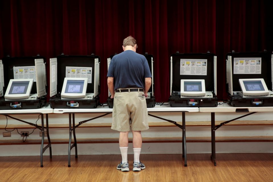 A man casts his vote in 2017 at Holy Cross Catholic Church in Tucker, Ga. (CNS/Chris Aluka Berry, Reuters) A man casts his vote in 2017 at Holy Cross Catholic Church in Tucker, Ga. (CNS/Chris Aluka Berry, Reuters)