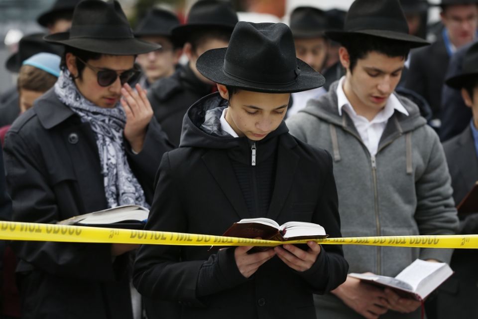 Students from the Yeshiva School pray in front of the Tree of Life synagogue Oct. 29, two days after a mass shooting at the Pittsburgh synagogue. (CNS/EPA/Jared Wickerham) Students from the Yeshiva School pray in front of the Tree of Life synagogue Oct. 29, two days after a mass shooting at the Pittsburgh synagogue. (CNS/EPA/Jared Wickerham)
