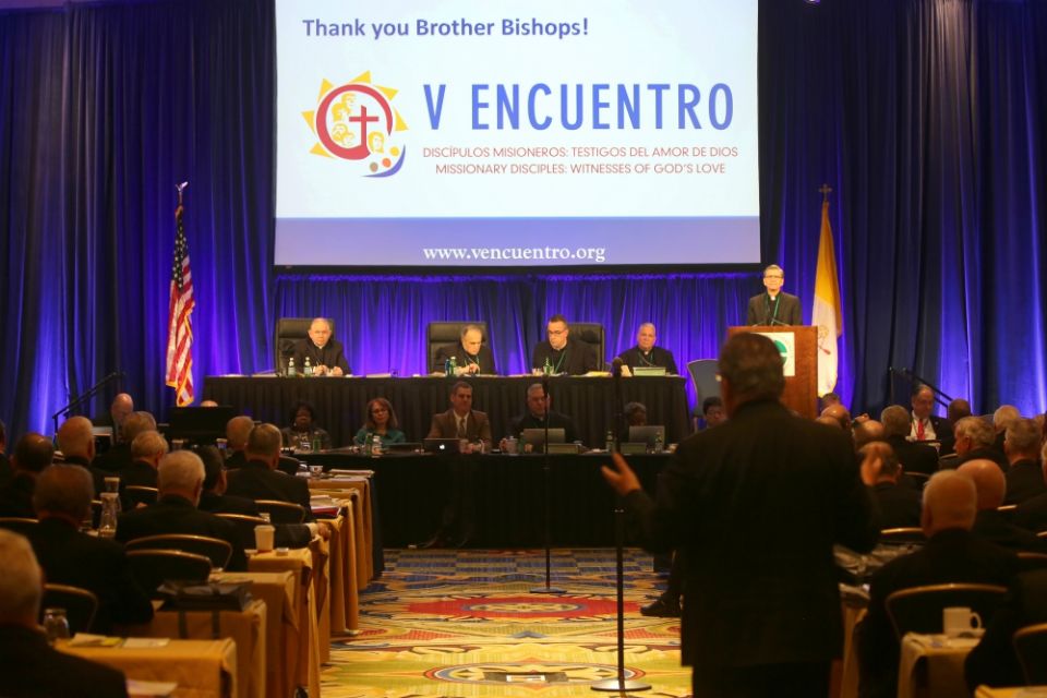 San Antonio Archbishop Gustavo García-Siller, at podium, listens to a question as he gives a report on V Encuentro at the 2018 fall general assembly of the U.S. Conference of Catholic Bishops in Baltimore. (CNS/Bob Roller) San Antonio Archbishop Gustavo García-Siller, at podium, listens to a question as he gives a report on V Encuentro at the 2018 fall general assembly of the U.S. Conference of Catholic Bishops in Baltimore. (CNS/Bob Roller)