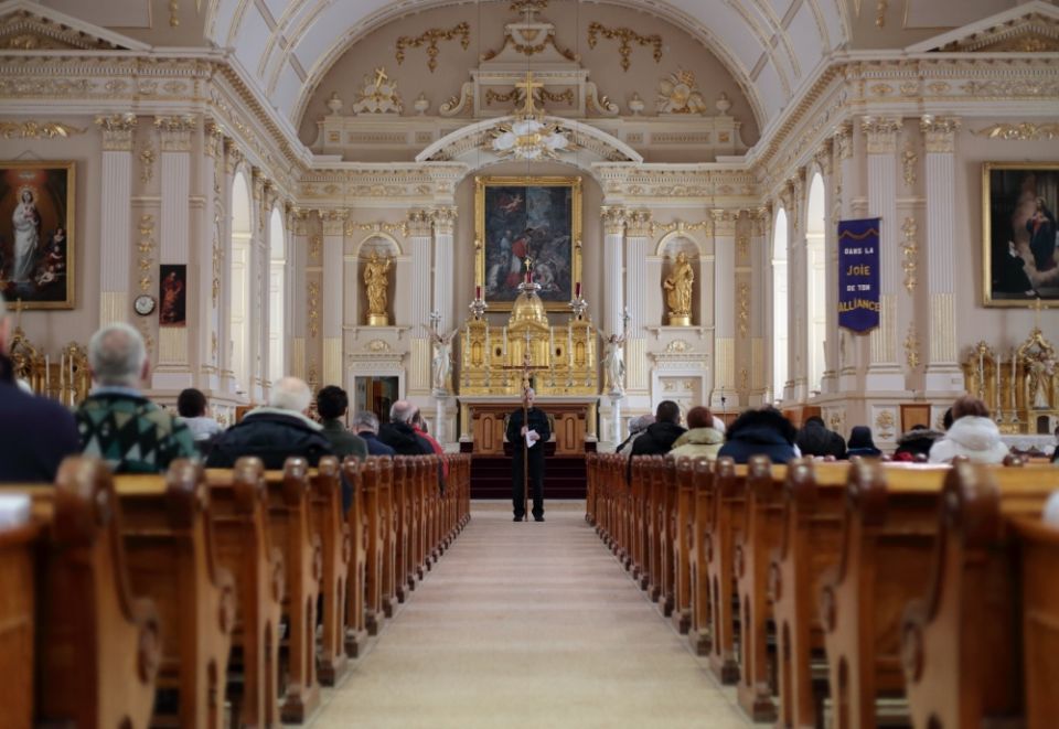 Parishioners from Saint-Charles-Borromée gather inside their 19th-century church in Quebec in 2016. A third of Canada's Christian architecture, some 9,000 churches, will close in the next 10 years, according to the National Trust for Canada. (CNS/Reuters) Parishioners from Saint-Charles-Borromée gather inside their 19th-century church in Quebec in 2016. A third of Canada's Christian architecture, some 9,000 churches, will close in the next 10 years, according to the National Trust for Canada. (CNS/Reuters)