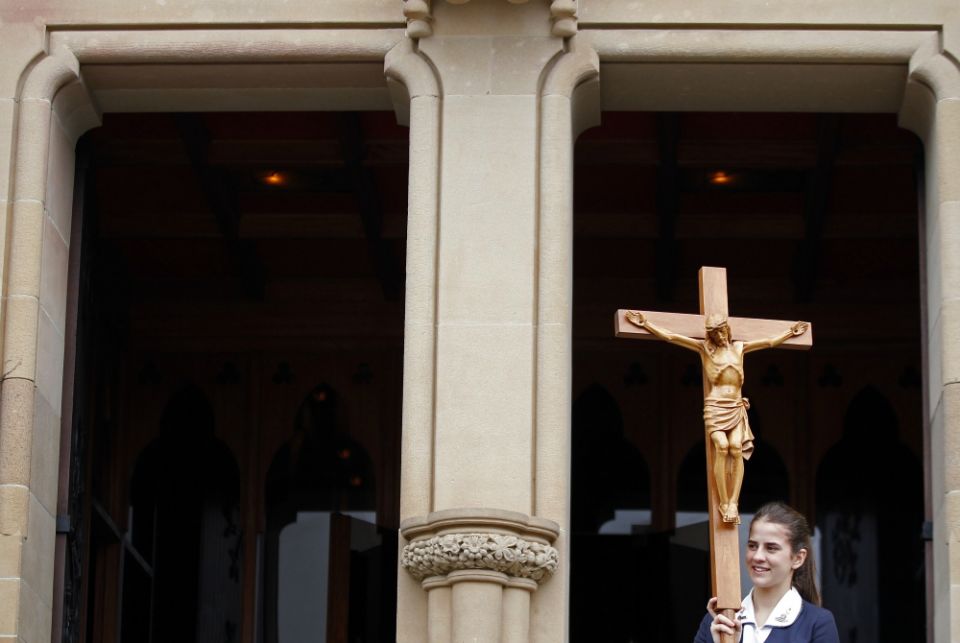 A young woman leaves St. Mary's Cathedral after a Mass in Sydney in 2013. (CNS/Reuters/Daniel Munoz) A young woman leaves St. Mary's Cathedral after a Mass in Sydney in 2013. (CNS/Reuters/Daniel Munoz)