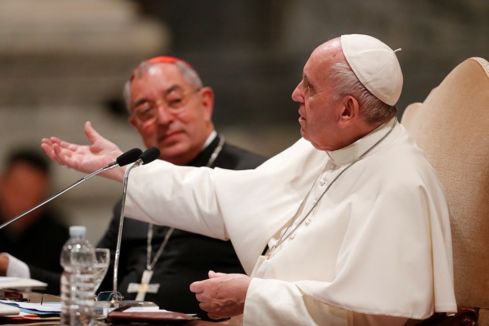 Pope Francis gestures as he addresses more than 1,000 diocesan leaders, both clergy and laity, May 9, 2019, at the Basilica of St. John Lateran, the cathedral of the Diocese of Rome. Seated next to the pope is Cardinal Angelo de Donatis, vicar of Rome. (C Pope Francis gestures as he addresses more than 1,000 diocesan leaders, both clergy and laity, May 9, 2019, at the Basilica of St. John Lateran, the cathedral of the Diocese of Rome. Seated next to the pope is Cardinal Angelo de Donatis, vicar of Rome. (C