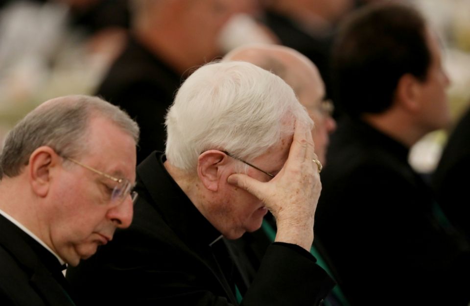 A bishop reacts on the first day of the spring general assembly of the U.S. Conference of Catholic Bishops in Baltimore June 11. (CNS/Bob Roller)