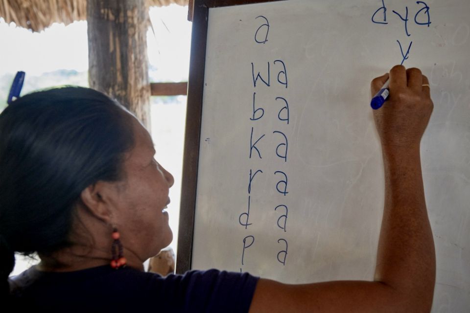 A woman participates in a workshop in St. Ignatius, Guyana. The workshop was designed to help laypeople improve their reading of the Sunday Scriptures in their own languages, so they can better lead liturgies in their indigenous communities. (CNS)