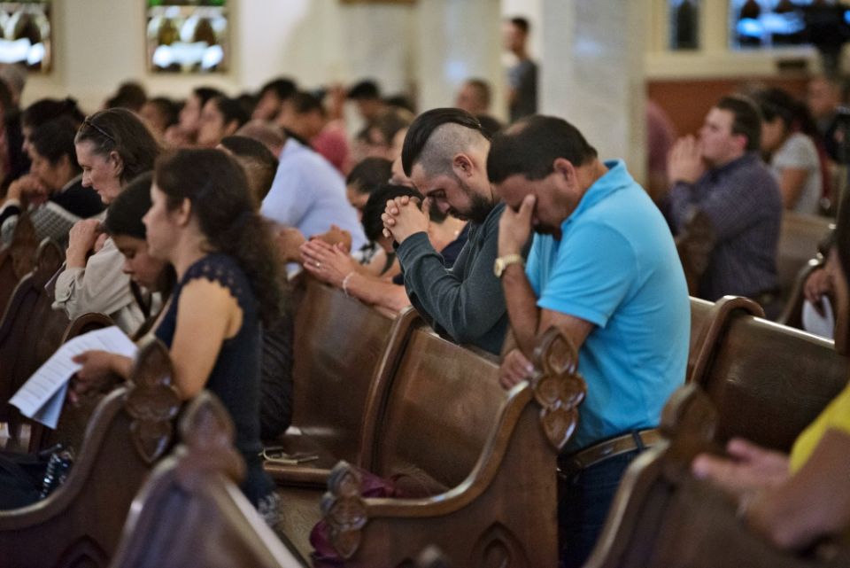 People pray during a healing Mass Aug. 7 at the Cathedral Shrine of the Virgin of Guadalupe in Dallas for the 31 victims killed in the mass shootings in El Paso, Texas, and Dayton, Ohio, Aug. 3 and 4. (CNS/The Texas Catholic/Jenna Teter) People pray during a healing Mass Aug. 7 at the Cathedral Shrine of the Virgin of Guadalupe in Dallas for the 31 victims killed in the mass shootings in El Paso, Texas, and Dayton, Ohio, Aug. 3 and 4. (CNS/The Texas Catholic/Jenna Teter)