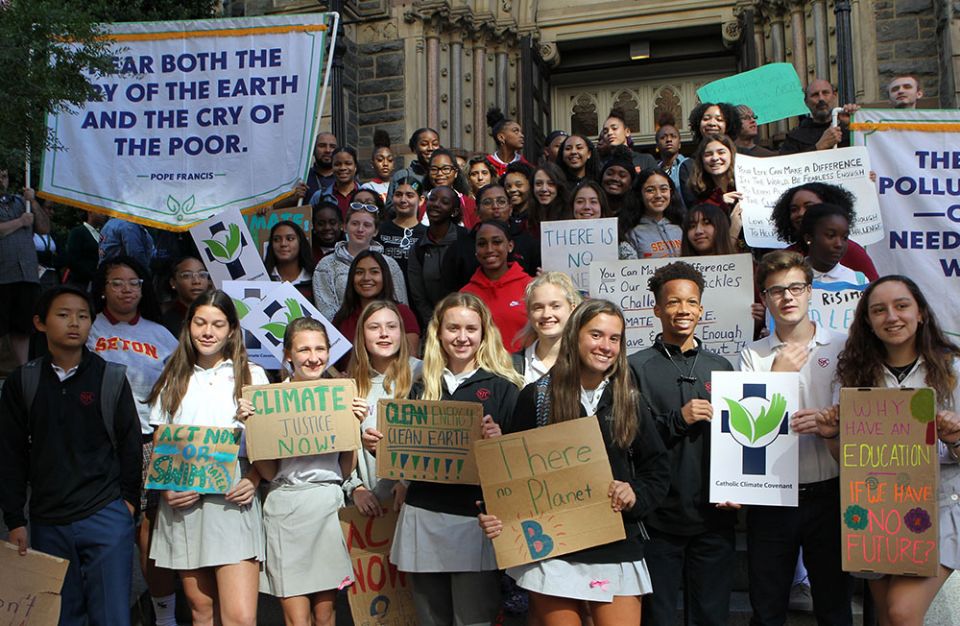 Students from Catholic schools in the Washington Archdiocese stand outside St. Patrick's Church in Washington Sept. 20, 2019, where about 200 of them had gathered to pray prior to the climate change rally in front of the Capitol. (CNS/Carol Zimmerman)