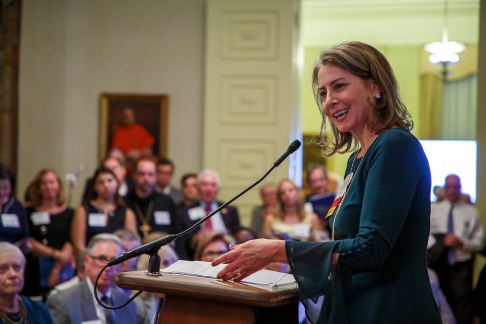 Krisanne Vaillancourt Murphy, executive director of the Catholic Mobilizing Network, speaks to guests at the Vatican Embassy in Washington Oct. 10, 2019. (CNS/Catholic Mobilizing Network/Jim Stipe)
