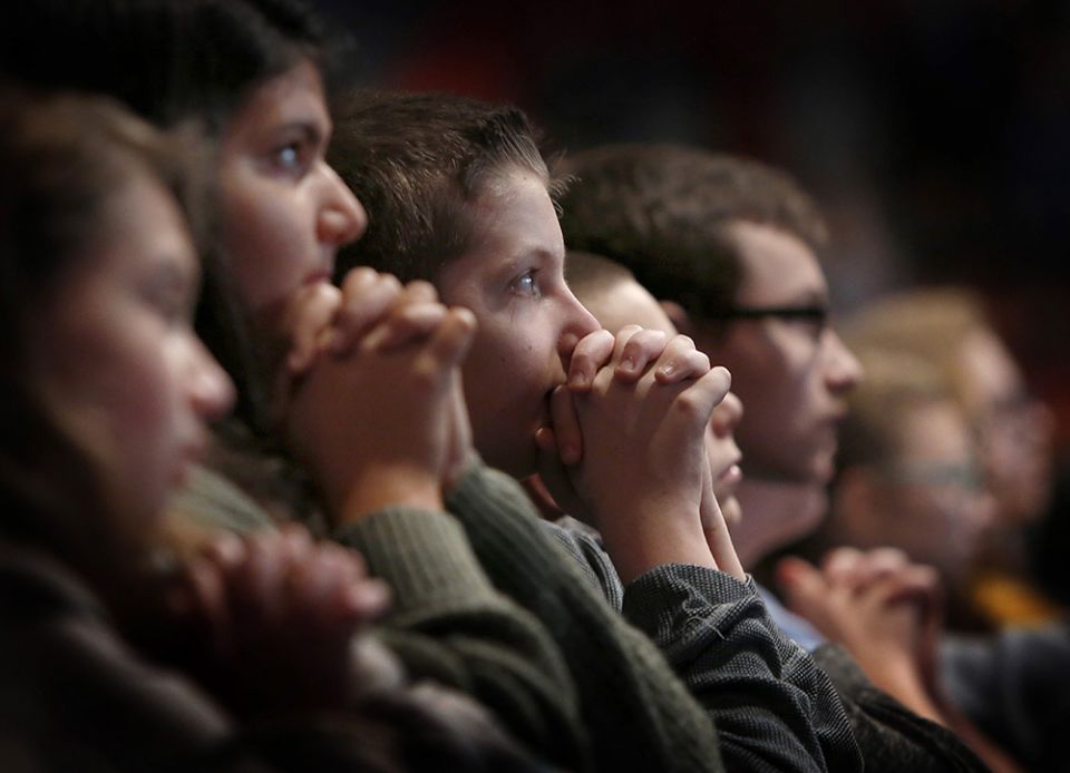 Students from St. Alphonsus/St. Patrick Catholic School in Lemont, Illinois, pray Oct. 19, 2019, during Holy Fire Chicago youth event. (CNS/Chicago Catholic/Karen Callaway)
