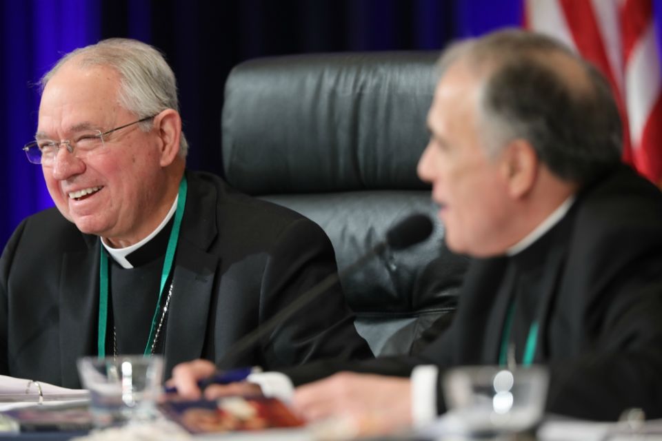 Los Angeles Archbishop José Gomez, president-elect of the U.S. Conference of Catholic Bishops, and outgoing president, Galveston-Houston Cardinal Daniel DiNardo, smile during the U.S. bishops' fall general assembly in Baltimore Nov. 13. (CNS/Bob Roller) Los Angeles Archbishop José Gomez, president-elect of the U.S. Conference of Catholic Bishops, and outgoing president, Galveston-Houston Cardinal Daniel DiNardo, smile during the U.S. bishops' fall general assembly in Baltimore Nov. 13. (CNS/Bob Roller)