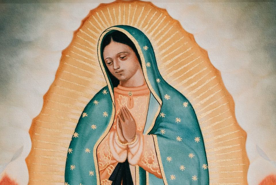 A painting by artist Lalo Garcia is seen in November 2019 an exhibit honoring Our Lady of Guadalupe and St. Juan Diego at the Cathedral of Our Lady of the Angels in Los Angeles. (CNS/Courtesy of the Los Angeles Archdiocese)