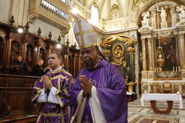 Bishop Edward K. Braxton of Belleville, Ill., leaves after concelebrating Mass with other U.S. bishops from Illinois, Indiana, and Wisconsin at the Basilica of St. John Lateran in Rome Dec. 11, 2019. The bishops were making their "ad limina" visits to the