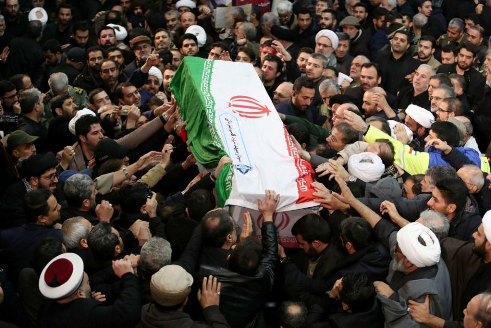 Mourners touch the casket of Iranian Maj. Gen. Qassem Soleimani during his funeral procession in Tehran Jan. 6. The military leader was killed Jan. 3 in a U.S. drone airstrike at Baghdad International Airport. (CNS/Khamenei website handout via Reuters) Mourners touch the casket of Iranian Maj. Gen. Qassem Soleimani during his funeral procession in Tehran Jan. 6. The military leader was killed Jan. 3 in a U.S. drone airstrike at Baghdad International Airport. (CNS/Khamenei website handout via Reuters)