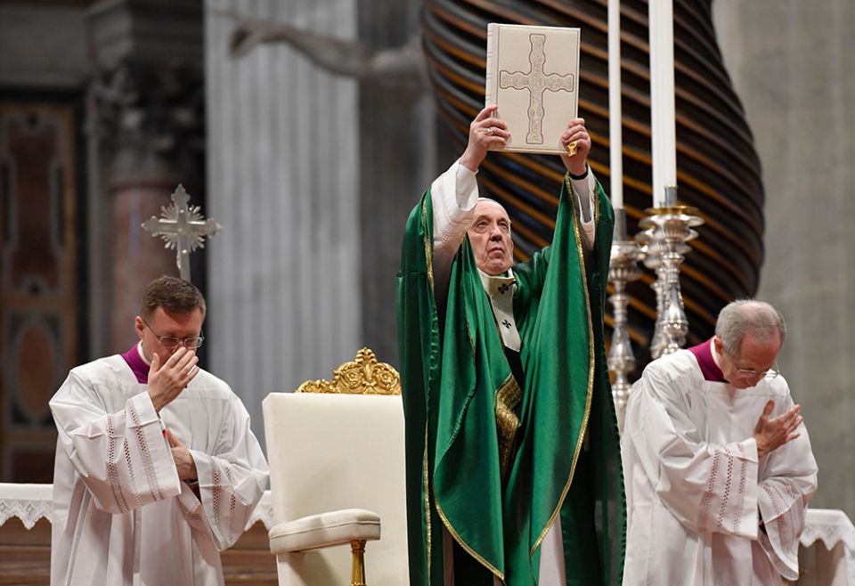 Pope Francis holds up the Lectionary, or book of Mass readings, that was used during the Second Vatican Council. (CNS/Vatican Media) Pope Francis holds up the Lectionary, or book of Mass readings, that was used during the Second Vatican Council. (CNS/Vatican Media)