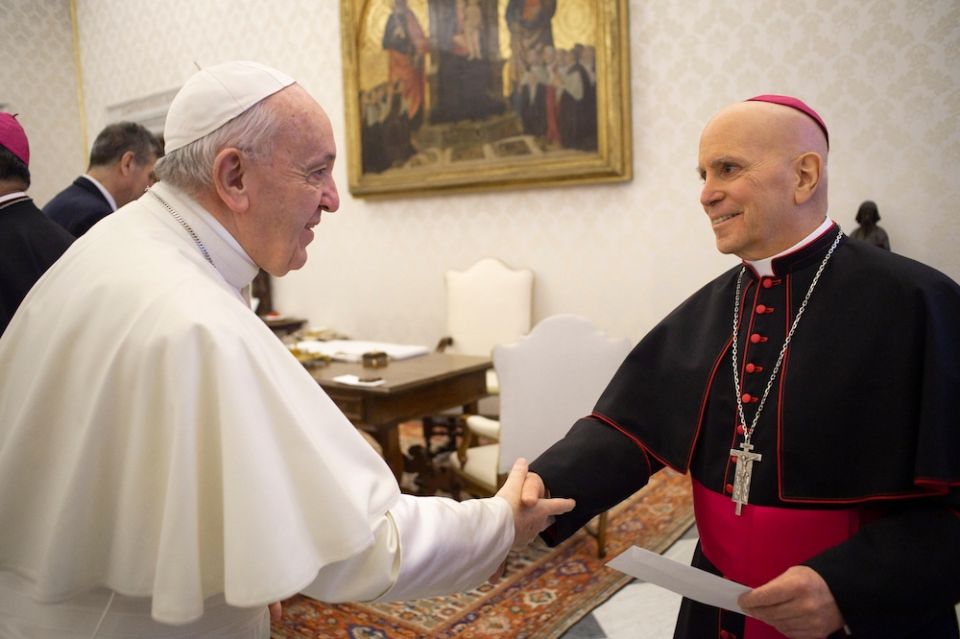 Pope Francis greets Archbishop Samuel Aquila of Denver, Colorado, during an audience with U.S. bishops making their "ad limina" visits to the Vatican Feb. 10, 2020. (CNS/Vatican Media)
