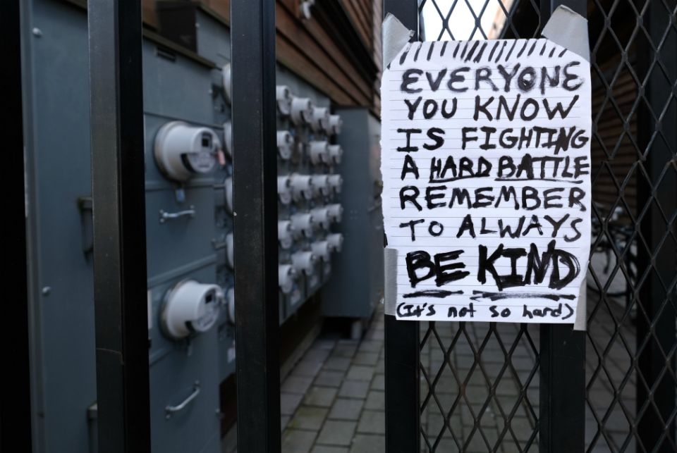 Pedestrians walking along Mississippi Avenue March 18 in Portland, Oregon, could see this handwritten message that acknowledged people are frightened amid the coronavirus pandemic but encouraged them to be kind to one another. (CNS/Reuters) Pedestrians walking along Mississippi Avenue March 18 in Portland, Oregon, could see this handwritten message that acknowledged people are frightened amid the coronavirus pandemic but encouraged them to be kind to one another. (CNS/Reuters)