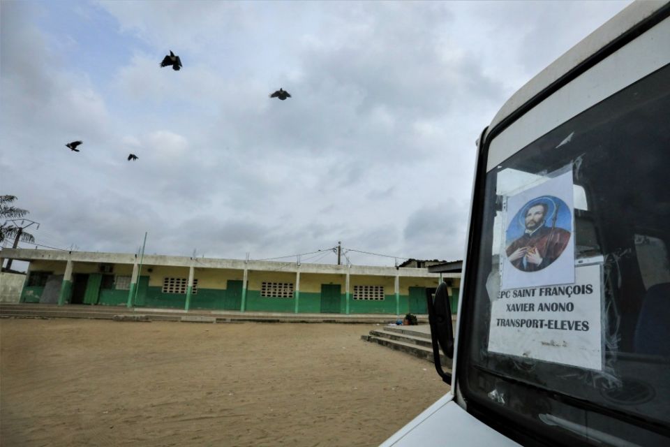 Birds fly above an empty St. Francis Xavier Catholic School during the coronavirus outbreak March 19 in Abidjan, Ivory Coast. (CNS/Reuters/Thierry Gouegnon)