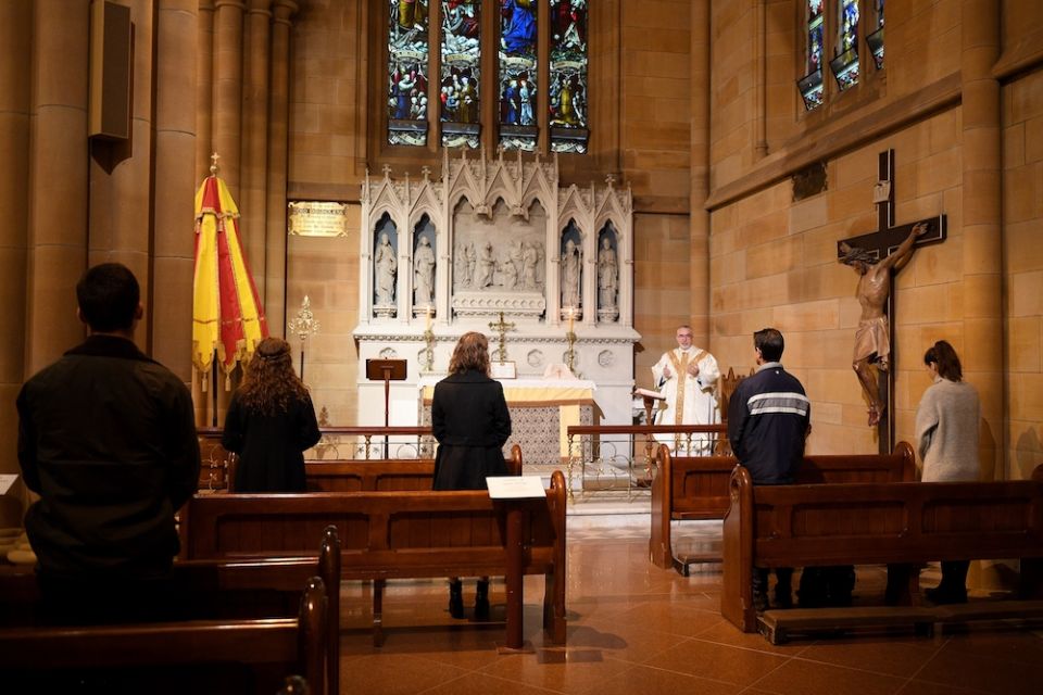 People attend Mass at St Mary's Cathedral in Sydney May 15, 2020, during the COVID-19 pandemic. (CNS/Dan Himbrechts, AAP Image via Reuters) People attend Mass at St Mary's Cathedral in Sydney May 15, 2020, during the COVID-19 pandemic. (CNS/Dan Himbrechts, AAP Image via Reuters)