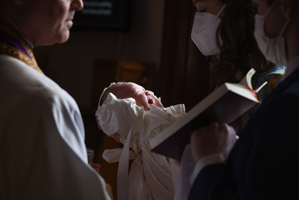 Beatrice Anne Borman is seen during her baptism April 18, 2020, at St. James Church in Falls Church, Virginia. (CNS/Zoey Maraist, Arlington Catholic Herald)